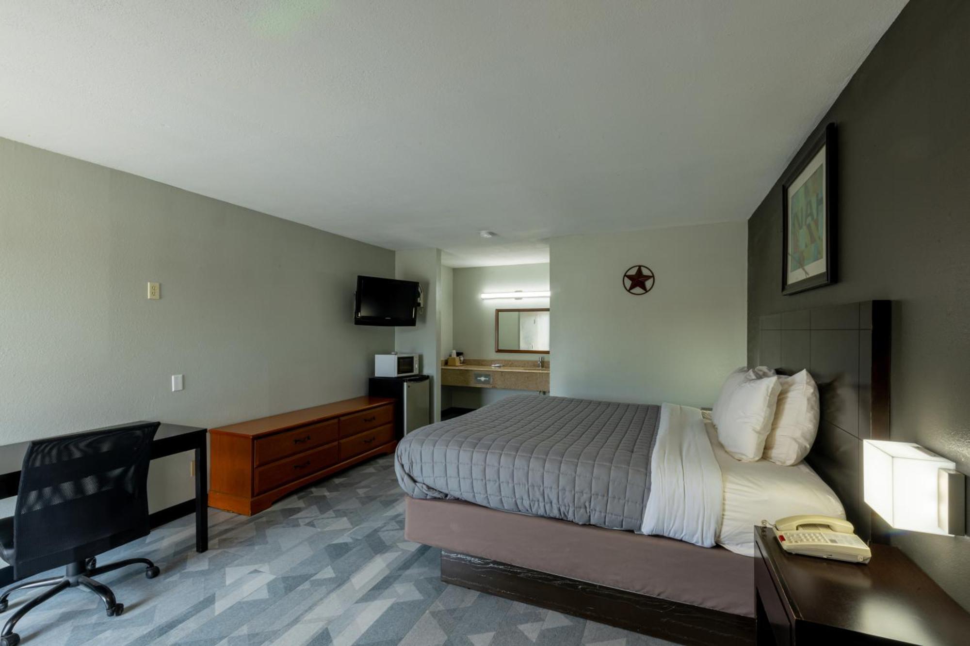 Freer Executive Inn And Studios Экстерьер фото